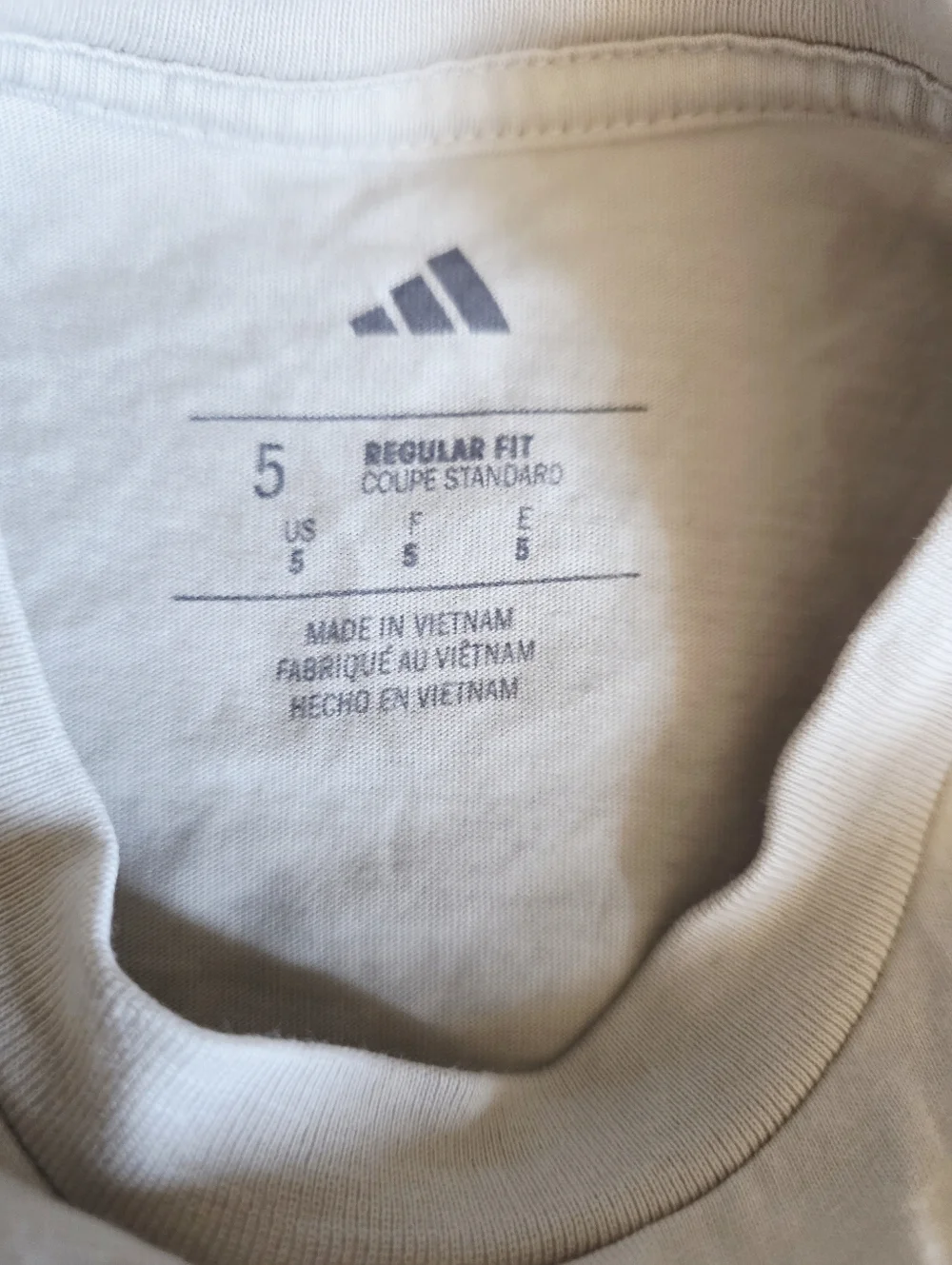 Adidas Cream Long Sleeve Tee with Playful Sports Graphic